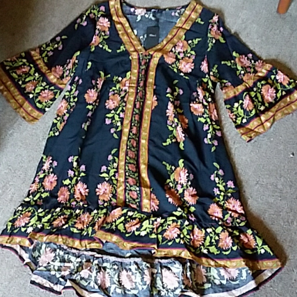 Loose fitting and flowing dress.